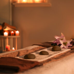 Interior of modern massage room in candle light